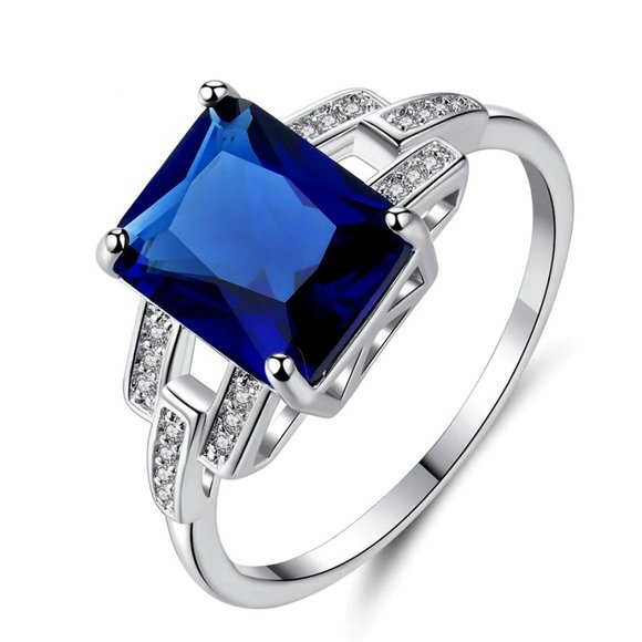 My Bead Emporium Jewelry - Silver ring with blue Sapphire stone.